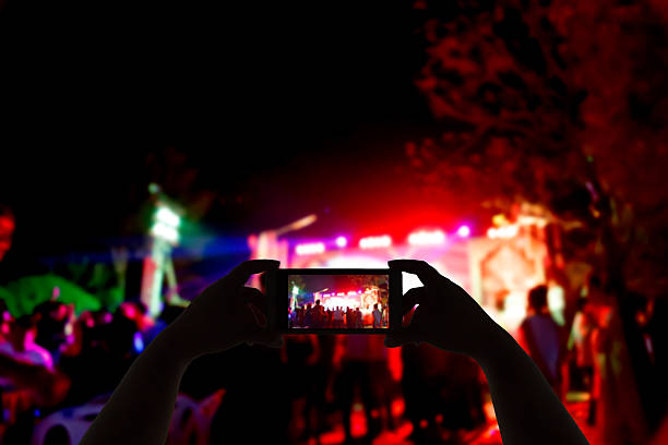 istock Take photo concert in front of stage 531868040