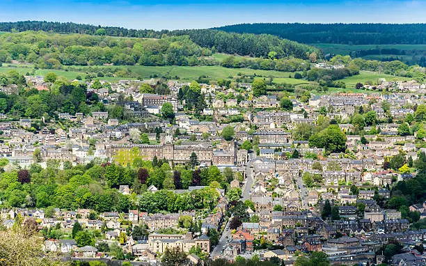 A view over the rural town of Matlock, Deryshire in the Peak District. Logos and signs removed. Many mulitple dwellings.