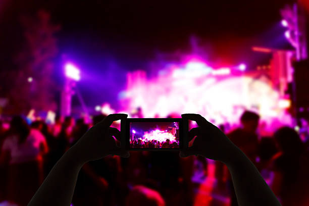 istock Take photo concert in front of stage 531868112