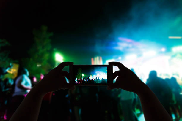istock Take photo concert in front of stage 531868170