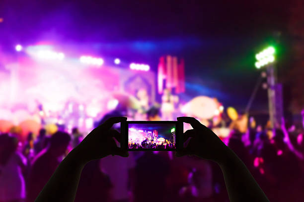 istock Take photo concert in front of stage 531868210