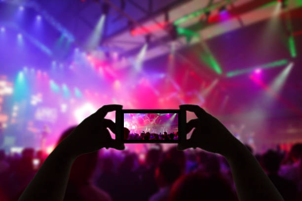 istock Take photo concert in front of stage 531868346