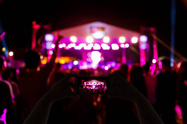 istock Take photo concert in front of stage 531868546