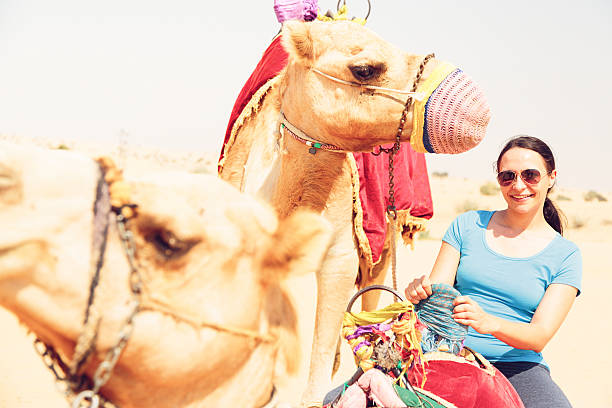 istock tourist riding a camel 531869161