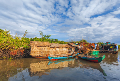 SIEM REAP, CAMBODIA DEC. 16: Cambodian people live on Tonle Sap Lake in Siem Reap, Cambodia on December 16, 2011. The village on the water.