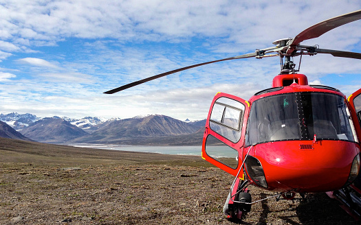 A helicopter in East Greenland, near the Carlsberg Fjord.