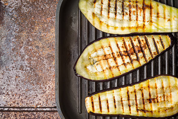 istock Grilled eggplants on the metal background top view 531872790