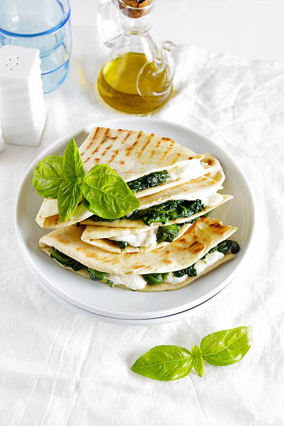 istock piadina with spinach and mozzarella. Italian healthy snack. stre 531872898