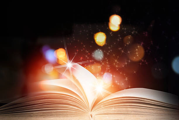 istock Abstract magic book on wooden background 531873608