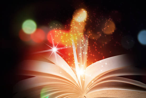 istock Abstract magic book on wooden background 531873762