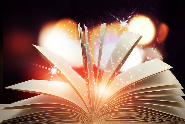 istock Abstract magic book on wooden background 531873864