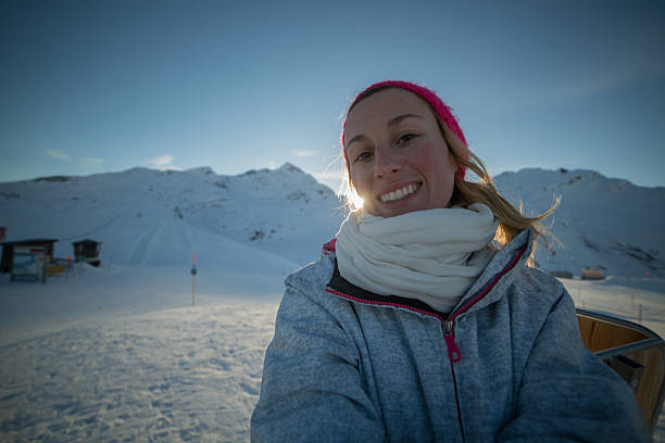 istock Woman on ski vacation taking a selfie 531882963