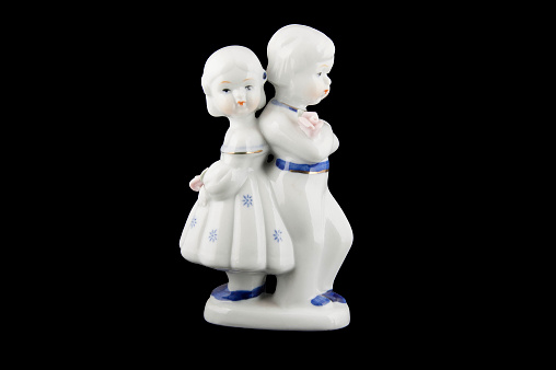 Small ceramic statue girl and boy