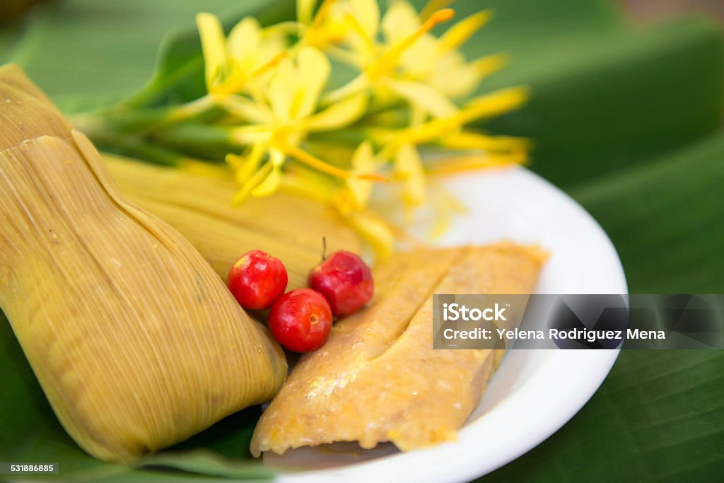 Cuban cuisine: traditional homemade tamales Cuban cuisine: traditional homemade tamal a popular Latin American dish which takes lot of hard work to prepare Tamale - Food Stock Photo