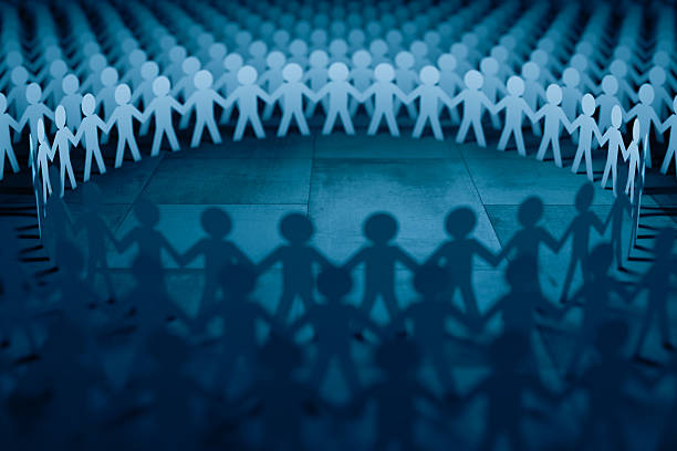 istock paper cutout people standing together,teamwork,cooperation concept 531887771