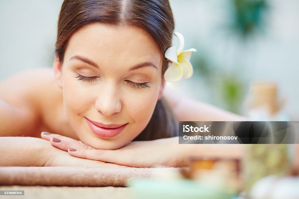 Visiting spa salon Serene girl relaxing and enjoying day spa Adult Stock Photo