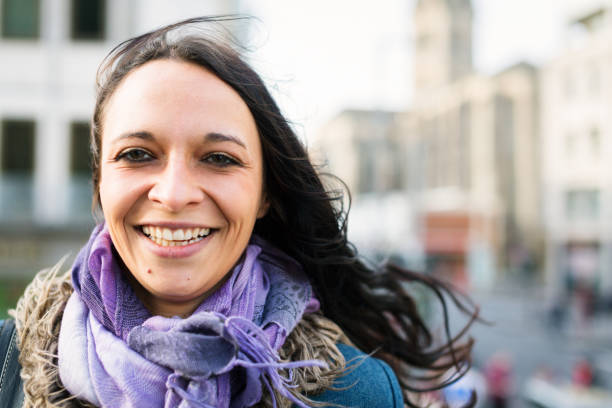 istock young woman walking in the city 531901421