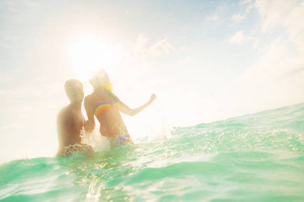 istock young couple having fun in the sea 531901811