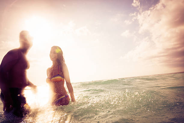istock young couple having fun in the sea 531901817