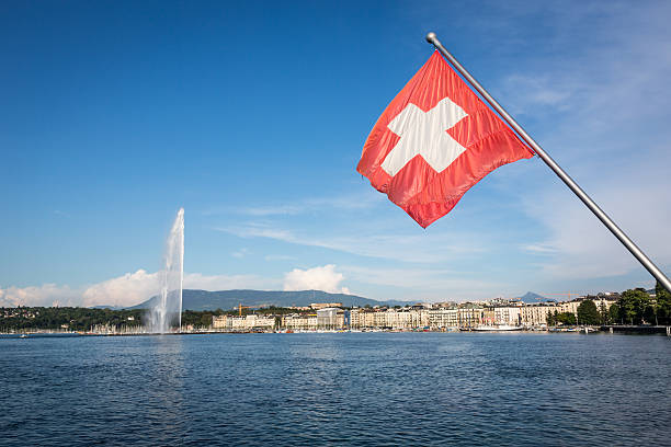 Lake Geneva and Jet d'Eau Water Fountain, Switzerland Jet d'eau fountain in Geneva, Switzerland geneva switzerland stock pictures, royalty-free photos & images