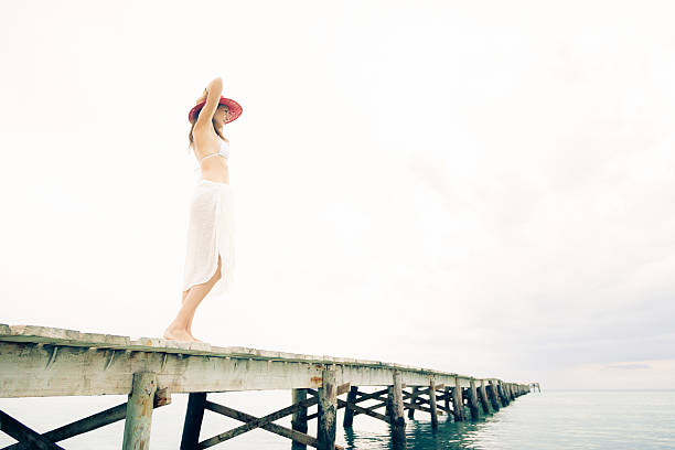 istock young woman by the sea 531902825