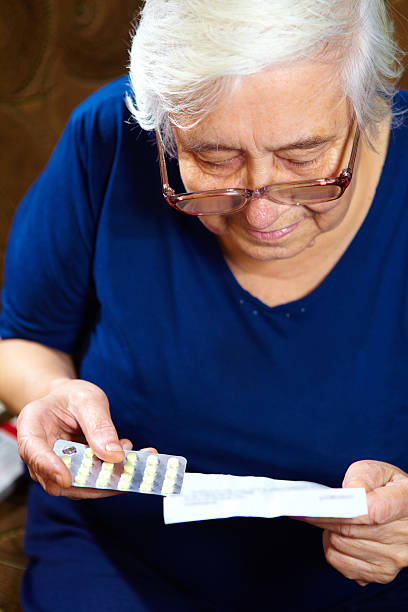 istock Senior female with pills 531903943
