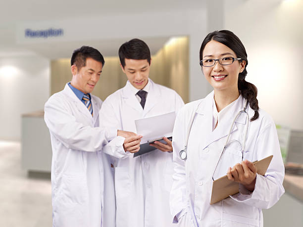 asian medical professionals portrait of a young female asian doctor. click for more: japanese female doctor stock pictures, royalty-free photos & images