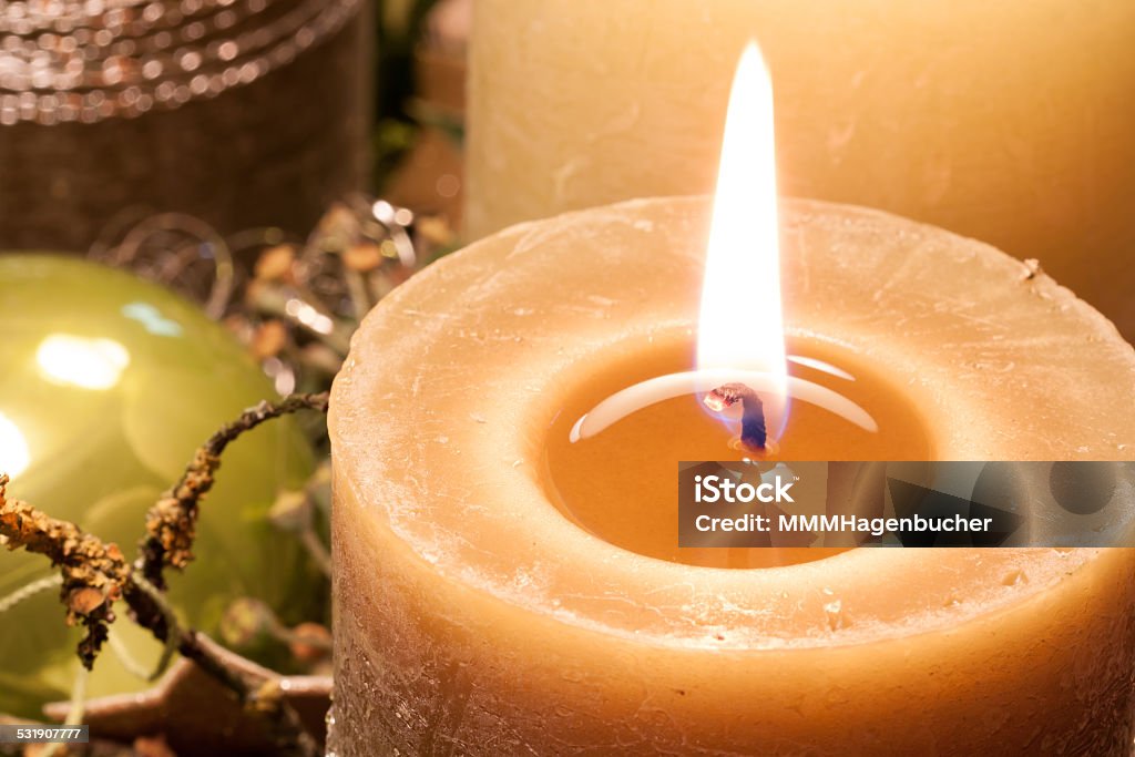 Pre-Christmas Time Pre-Christmas Time - Christmas wreath with candle-lit Christmas tree balls for decoration 2015 Stock Photo