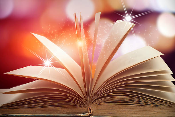 istock Abstract magic book on wooden background 531911752