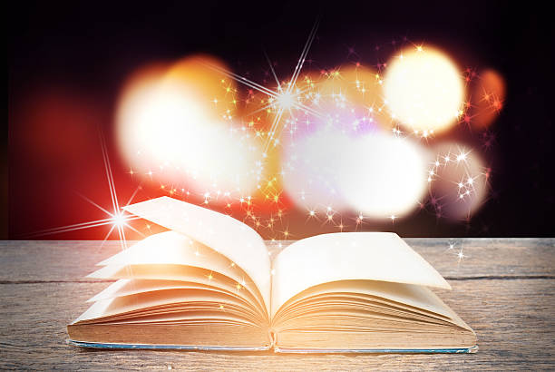 istock Abstract magic book on wooden background 531911798