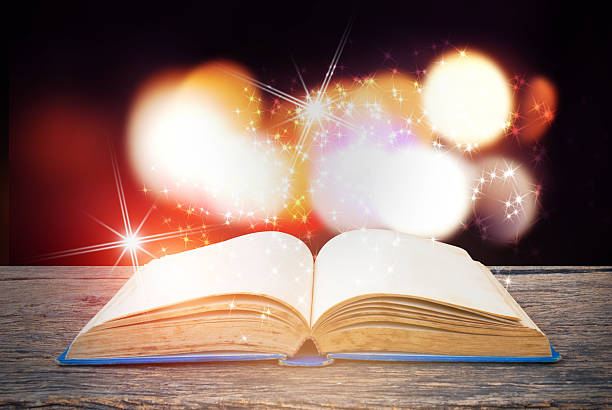 istock Abstract magic book on wooden background 531911856