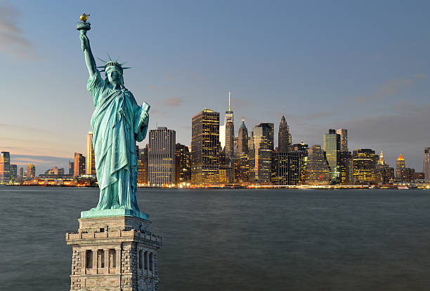 istock Manhattah skyline at night and Statue of Liberty. 531914318
