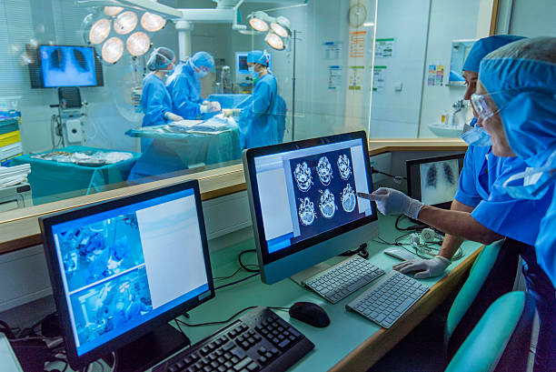 Doctor working in hospital's control room
