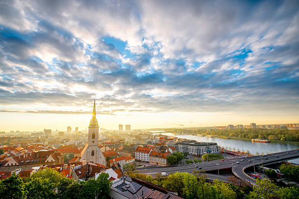 View on the old town in Bratislava Bratislava cityscape view on the old town with Saint Martin's cathedral tower from the castle hill on the morning in Slovakia bratislava photos stock pictures, royalty-free photos & images