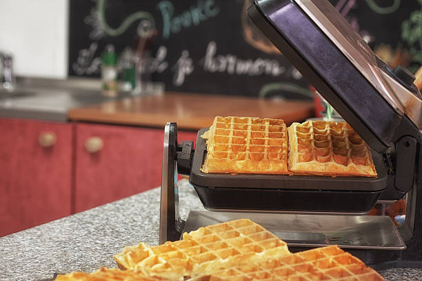 istock Preparing Homemade Waffles in Waffle Iron 531917976
