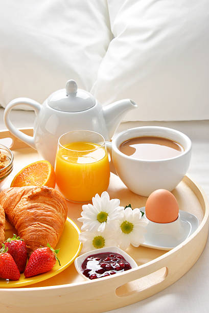 istock Breakfast tray in bed in hotel room 531918396
