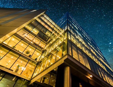 A block of offices at night in London, England.