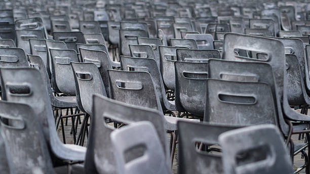 istock Empty chairs on the St. Peters square in Vatican 531920388