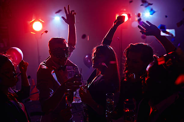 istock Friends cheering in club 531921394