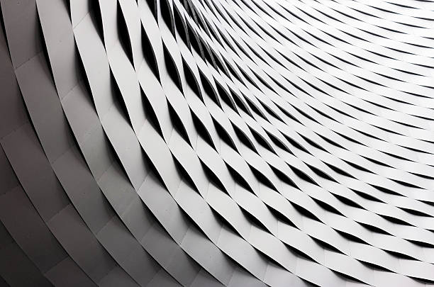 Curved and rippled metal roof construction stock photo
