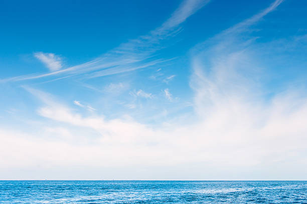 istock White skies over the blue ocean 531924274