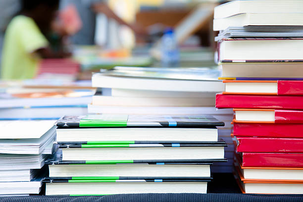 istock Book piles in a market stall 531924392