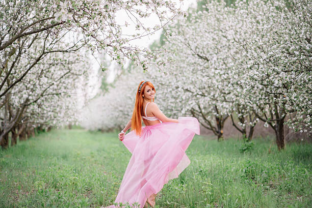 istock young beautiful woman in the lush spring garden 531925396
