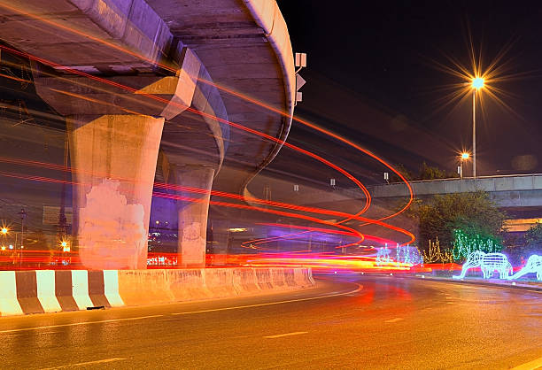 istock Blurs the traffic flow night lights of a car 531925821