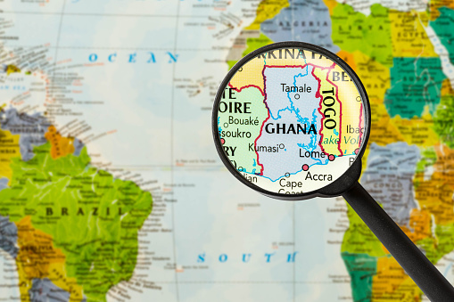 Map of Republic of Ghana through magnifying glass