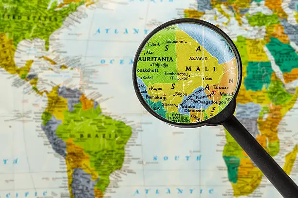 Map of Republic of Mali through magnifying glass