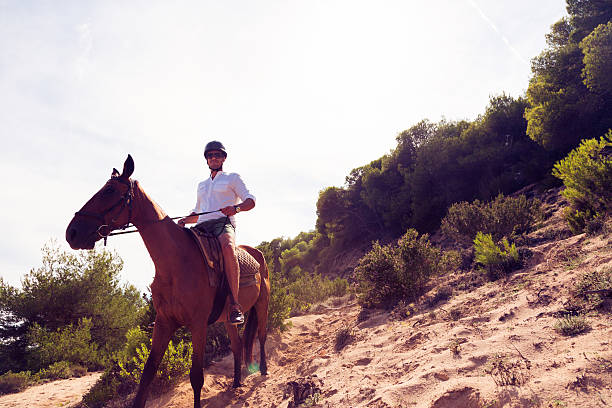 istock young man horseback riding 531927153