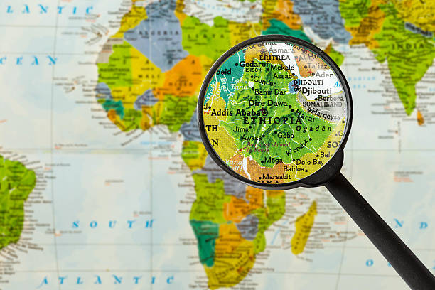Map of Federal Democratic Republic of Ethiopia Map of Federal Democratic Republic of Ethiopia through magnifying glass addis ababa ethiopia photos stock pictures, royalty-free photos & images