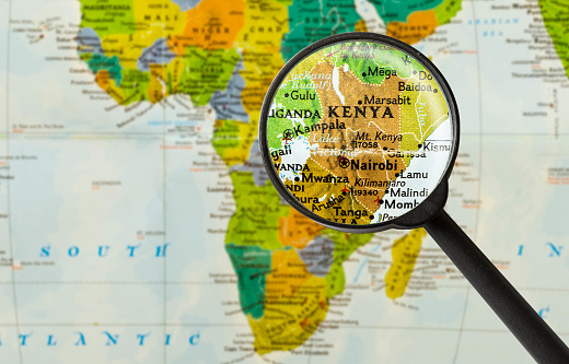 Map of Republic of Kenya through magnifying glass