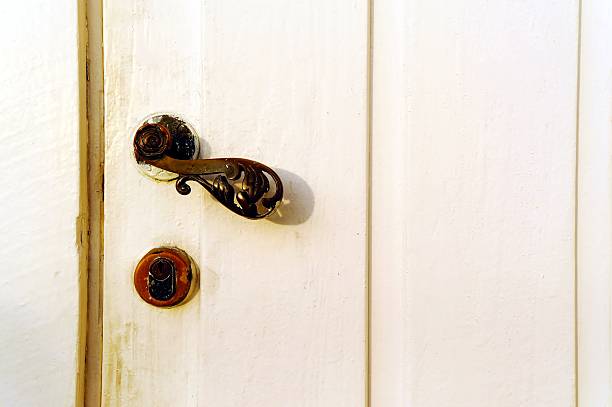 istock Old metal handle. Wooden doors. 531927533